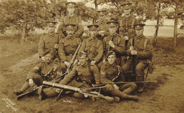 2nd Lt Joseph Booth, right on the front row, and a Royal Field Artillery battery and gun.